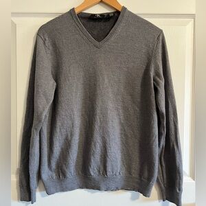 Women’s Calvin Klein Heather Gray V-neck sweater.